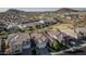 An aerial view of a well-planned neighborhood with beautiful homes and mountain views at 26844 N 73Rd Dr, Peoria, AZ 85383