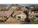 A clean backyard features a covered patio, privacy walls, and desert landscaping at 26844 N 73Rd Dr, Peoria, AZ 85383