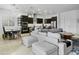 Open-concept dining and living areas with modern fixtures and decor at 26844 N 73Rd Dr, Peoria, AZ 85383