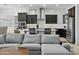 View of open-concept space that includes seating area and dark wood cabinets at 26844 N 73Rd Dr, Peoria, AZ 85383