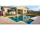 Backyard pool and patio create an outdoor oasis for entertainment at 26844 N 73Rd Dr, Peoria, AZ 85383