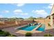 Backyard pool area, complete with spa, travertine tile and mountain views at 26844 N 73Rd Dr, Peoria, AZ 85383