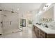 Modern bathroom features a glass shower, double vanity, soaking tub, and natural light at 30600 N Pima Rd # 76, Scottsdale, AZ 85266