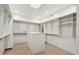 Walk-in closet with custom shelving and storage, providing ample space at 30600 N Pima Rd # 76, Scottsdale, AZ 85266