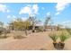 Elegant desert home with a paver driveway, mature landscaping, and charming curb appeal at 30600 N Pima Rd # 76, Scottsdale, AZ 85266