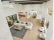 Overhead view of the open-concept living room, showcasing high ceilings, wood beams, and flowing design to the kitchen at 30600 N Pima Rd # 76, Scottsdale, AZ 85266
