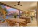 Inviting covered patio with dining and lounge areas, perfect for enjoying outdoor living and desert sunsets at 30600 N Pima Rd # 76, Scottsdale, AZ 85266