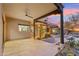 Spacious patio area featuring a covered seating, fireplace, and an inviting outdoor living space at 30600 N Pima Rd # 76, Scottsdale, AZ 85266