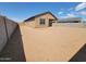 Large backyard offers plenty of room for recreation and features a covered patio area at 318 S San Fernando Ln, Casa Grande, AZ 85194