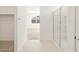 Bathroom features a glass enclosed shower with a tiled floor and view into the bedroom at 318 S San Fernando Ln, Casa Grande, AZ 85194