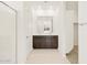 Bathroom featuring a dual vanity, a walk in shower and tile flooring at 318 S San Fernando Ln, Casa Grande, AZ 85194