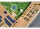 Aerial view showcasing a home with solar panels, a trampoline, and gardens at 3222 W Hearn Rd, Phoenix, AZ 85053
