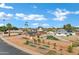 Charming home featuring solar panels, garden beds, a covered patio, a pool, and a fully fenced yard at 3222 W Hearn Rd, Phoenix, AZ 85053