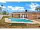 Inviting backyard swimming pool surrounded by palm trees and greenery at 3222 W Hearn Rd, Phoenix, AZ 85053
