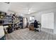 Bright storage room featuring tile flooring and ample shelving for organization and storage needs at 3222 W Hearn Rd, Phoenix, AZ 85053