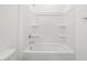 A crisp, clean white bathtub shower combo offers a serene space for relaxation at 345 S Alegria Ln, Casa Grande, AZ 85194