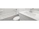A pristine bathroom with a sleek sink and tub presents a refreshing, minimalist design at 345 S Alegria Ln, Casa Grande, AZ 85194