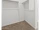This walk-in closet features carpet flooring and shelving around two walls at 345 S Alegria Ln, Casa Grande, AZ 85194