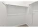 A neat, empty closet awaits organizational touches, ready to house wardrobes at 345 S Alegria Ln, Casa Grande, AZ 85194