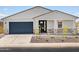 Charming single-story home with stone accents, desert landscaping, and a two-car garage at 345 S Alegria Ln, Casa Grande, AZ 85194