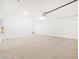 A large, open garage space provides ample room for parking and storage at 345 S Alegria Ln, Casa Grande, AZ 85194