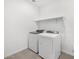 Modern white laundry machines stand ready for convenience in this efficient space at 345 S Alegria Ln, Casa Grande, AZ 85194