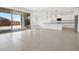 Bright open-concept area flows from the kitchen to the patio through sliding doors, with plenty of natural light at 345 S Alegria Ln, Casa Grande, AZ 85194