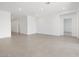 Large living room with neutral tile and ample natural light is ready for your personal touch at 345 S Alegria Ln, Casa Grande, AZ 85194