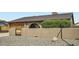 Charming single-story home with a two-car garage and a decorative privacy wall at 3514 W Charleston Ave, Glendale, AZ 85308