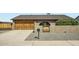 Charming single-story home with a two-car garage and a decorative privacy wall at 3514 W Charleston Ave, Glendale, AZ 85308