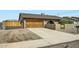 Charming single-story home with a two-car garage and a decorative privacy wall at 3514 W Charleston Ave, Glendale, AZ 85308