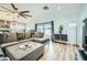 Open-concept living space with access to the backyard, modern decor and a kitchen view at 3514 W Charleston Ave, Glendale, AZ 85308