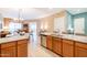 Open concept kitchen with granite counters and stainless steel appliances at 36600 N Cave Creek Rd # 17D, Cave Creek, AZ 85331