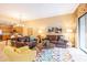 Comfortable living room with leather sofas and colorful area rug at 36600 N Cave Creek Rd # 17D, Cave Creek, AZ 85331