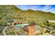 Community pool area with mountain views, seating, and a covered pavilion in a desert landscape at 36600 N Cave Creek Rd # 17D, Cave Creek, AZ 85331