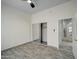 Bedroom with tile floors and sliding door closet at 3918 E Carson Rd, Phoenix, AZ 85042