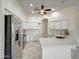 Contemporary kitchen with white cabinets, quartz countertops, and stainless steel appliances at 3918 E Carson Rd, Phoenix, AZ 85042