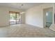 Living room featuring sliding glass doors opening to outdoor patio at 3918 E Carson Rd, Phoenix, AZ 85042
