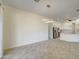 View of the living room open to the modern kitchen at 3918 E Carson Rd, Phoenix, AZ 85042