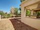 Covered outdoor grill area featuring a built-in grill and desert landscaping at 3918 E Carson Rd, Phoenix, AZ 85042
