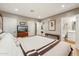 View of bedroom with wood floors and ensuite bathroom at 4130 N 4Th Ave, Phoenix, AZ 85013