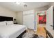 Comfortable bedroom featuring a spacious layout and neutral color palette and ensuite entrance to additional room at 4130 N 4Th Ave, Phoenix, AZ 85013