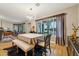 Dining room with large bright windows and seating for four at 4130 N 4Th Ave, Phoenix, AZ 85013