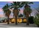 Charming single-story home framed by majestic palm trees and desert landscaping at 4130 N 4Th Ave, Phoenix, AZ 85013