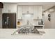 Kitchen featuring white subway tile backsplash and stainless appliances at 4130 N 4Th Ave, Phoenix, AZ 85013