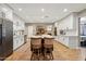 Kitchen with large island, seating, and stainless appliances at 4130 N 4Th Ave, Phoenix, AZ 85013