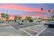 Street view with pedestrian crosswalk and traffic lights against a vibrant sunset sky at 4130 N 4Th Ave, Phoenix, AZ 85013