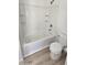 Clean bathroom design featuring a shower-tub combo and a toilet at 4908 N 110Th Dr, Phoenix, AZ 85037