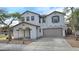 Beautiful home with a two car garage and a charming entrance with arched columns at 4908 N 110Th Dr, Phoenix, AZ 85037