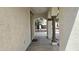 Inviting front porch with columns and a view of the neighborhood at 4908 N 110Th Dr, Phoenix, AZ 85037
